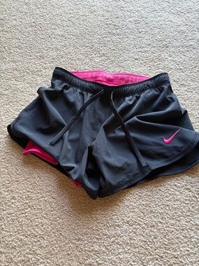 Nike Women’s Black Athletic Shorts with Hot Pink Lining